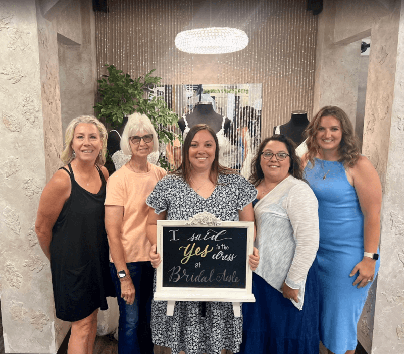 Bride and guests during VIP bridal experience — exclusive wedding dress shopping in Minnesota