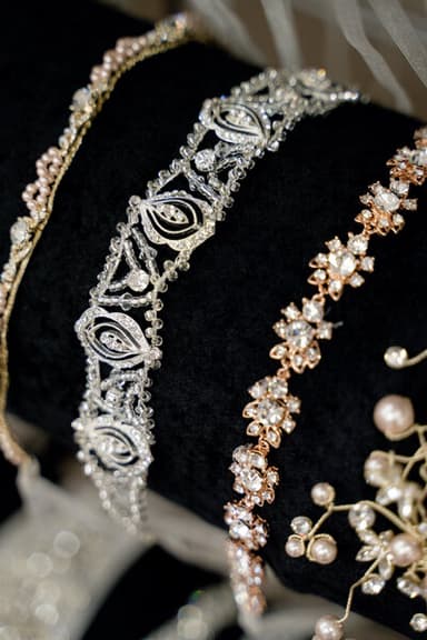 Bride trying on wedding dress and veil — best place to find bridesmaid & bridal dresses Minnesota