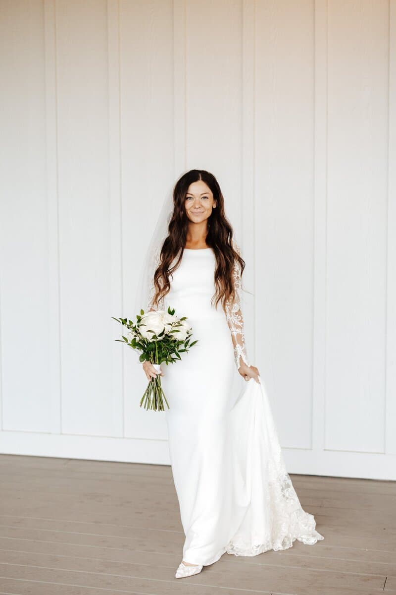 Real Minnesota bride in designer wedding gown from Bridal Aisle Boutique, Osseo MN