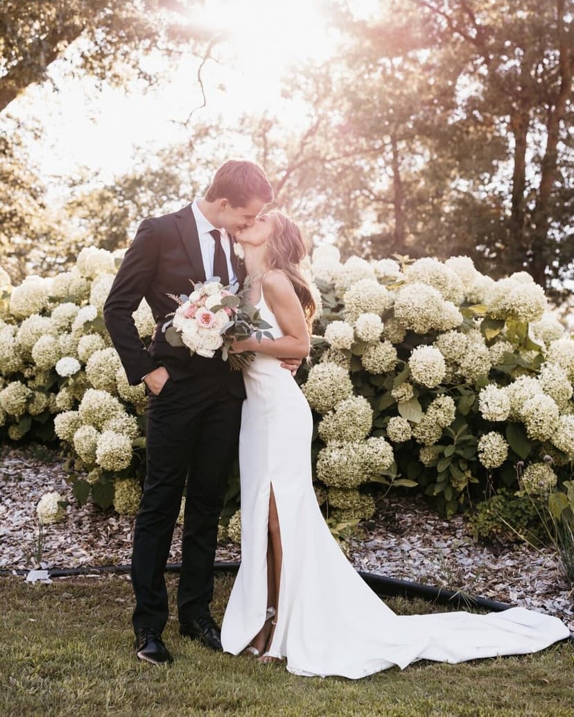 Real Minnesota bride in designer wedding gown from Bridal Aisle Boutique, Osseo MN